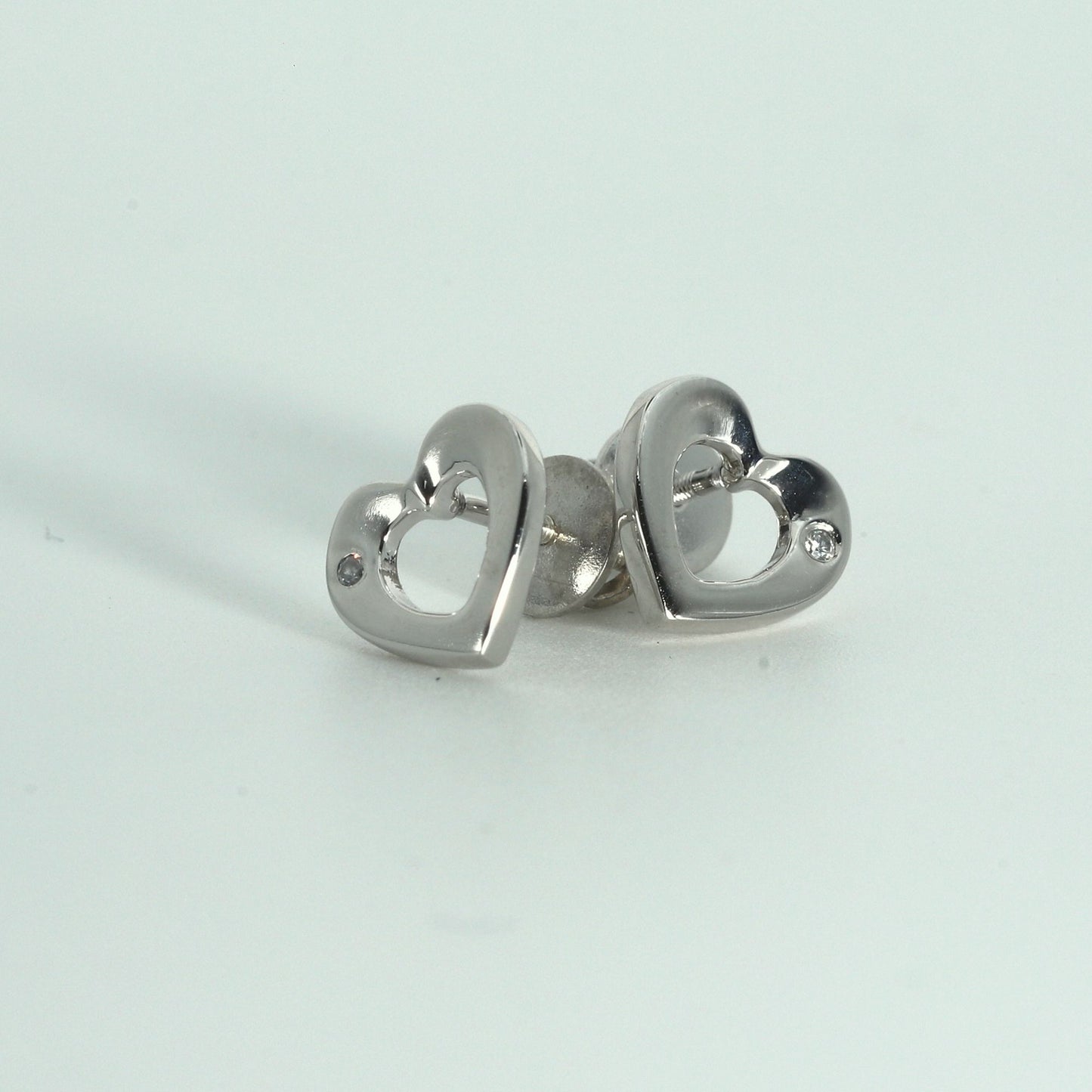 HEART SHAPED EARRINGS WITH EMBEDDED STONE - STERLING SILVER