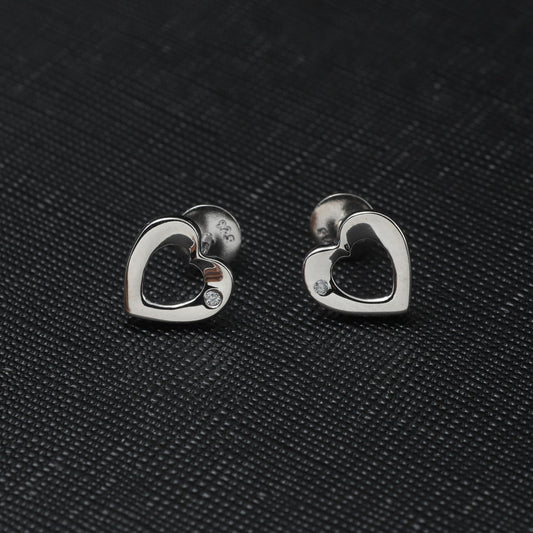 HEART SHAPED EARRINGS WITH EMBEDDED STONE - STERLING SILVER