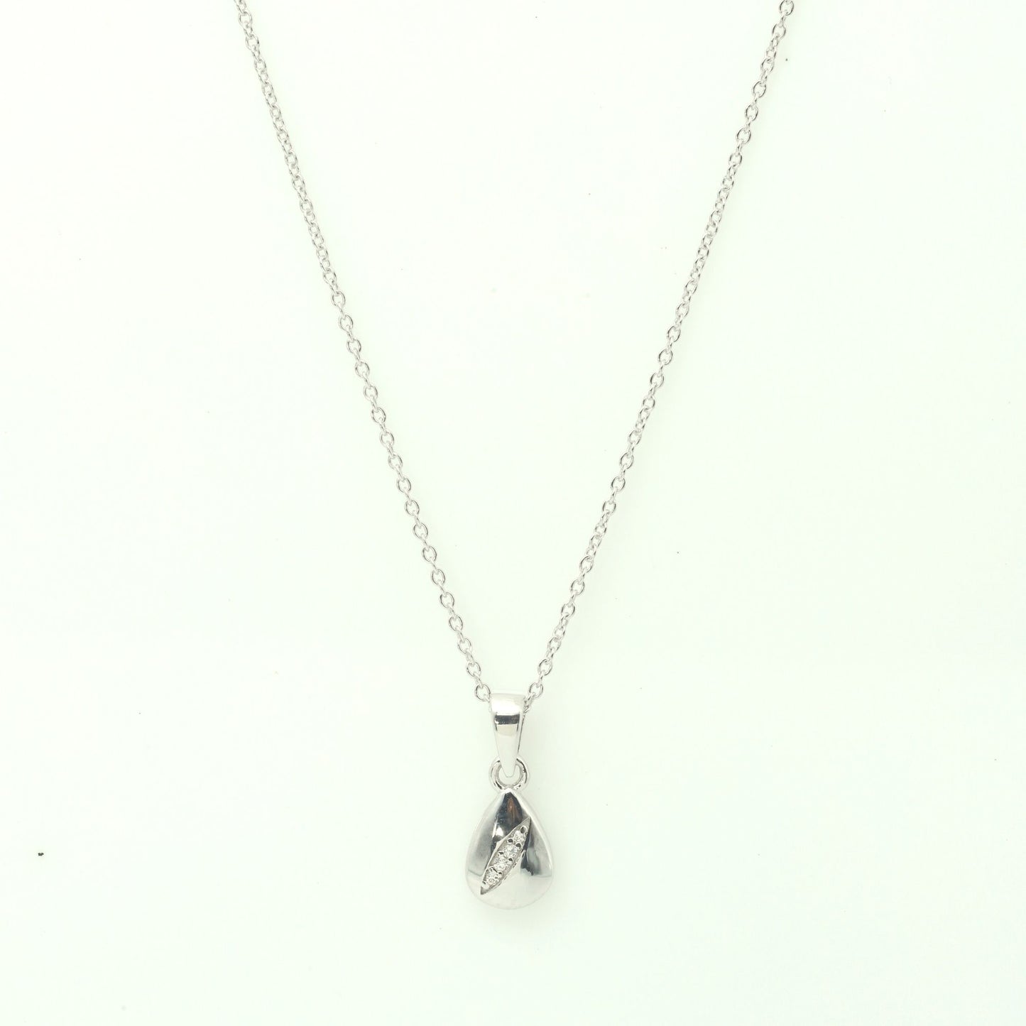 DROP PEAR PENDANT WITH EMBEDDED ZIRCONIA STONES - STERLING SILVER